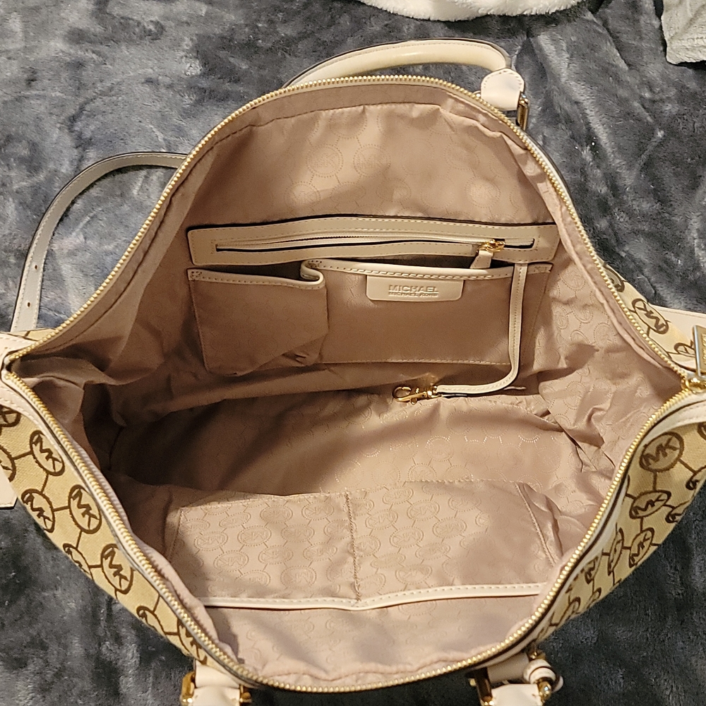 Micheal Kors purse cream and brown colored